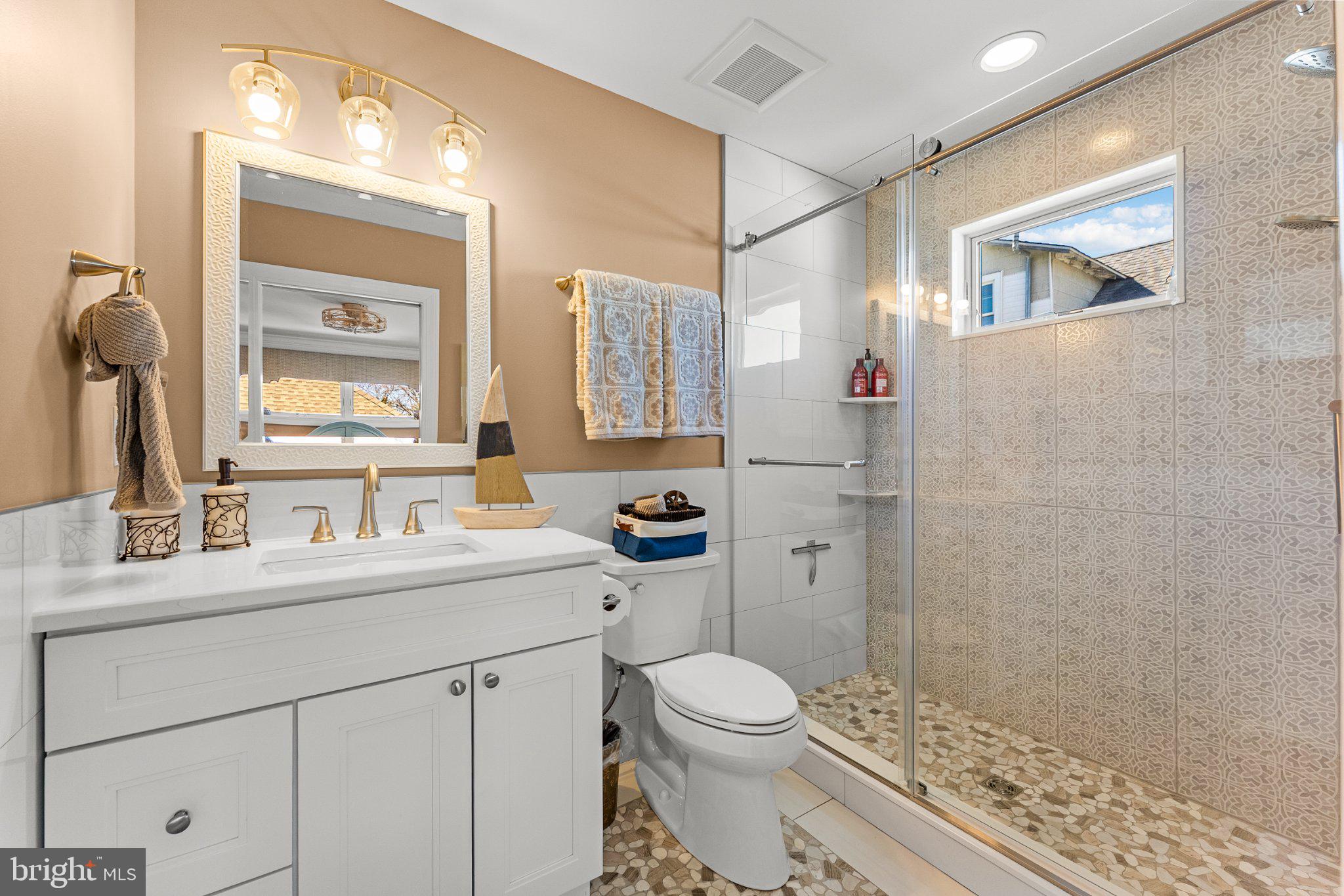 112 West Wisteria Road Wildwood, NJ 08260 - Photo 26 of 48 Modern bathroom with elegant finishes.