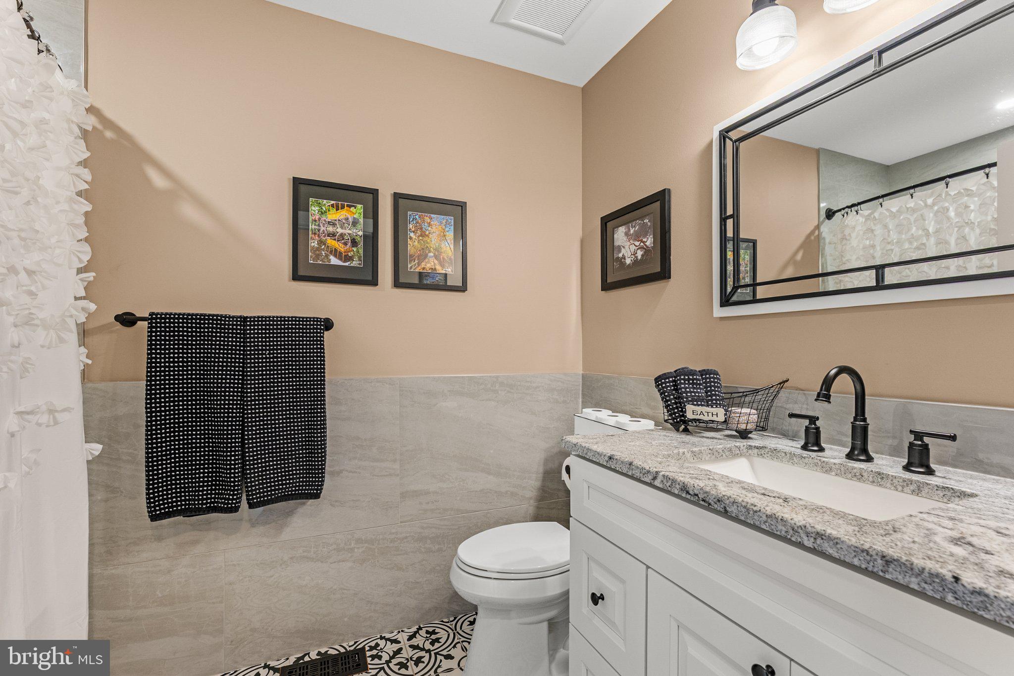 112 West Wisteria Road Wildwood, NJ 08260 - Photo 28 of 48 Chic bathroom with modern elegance.