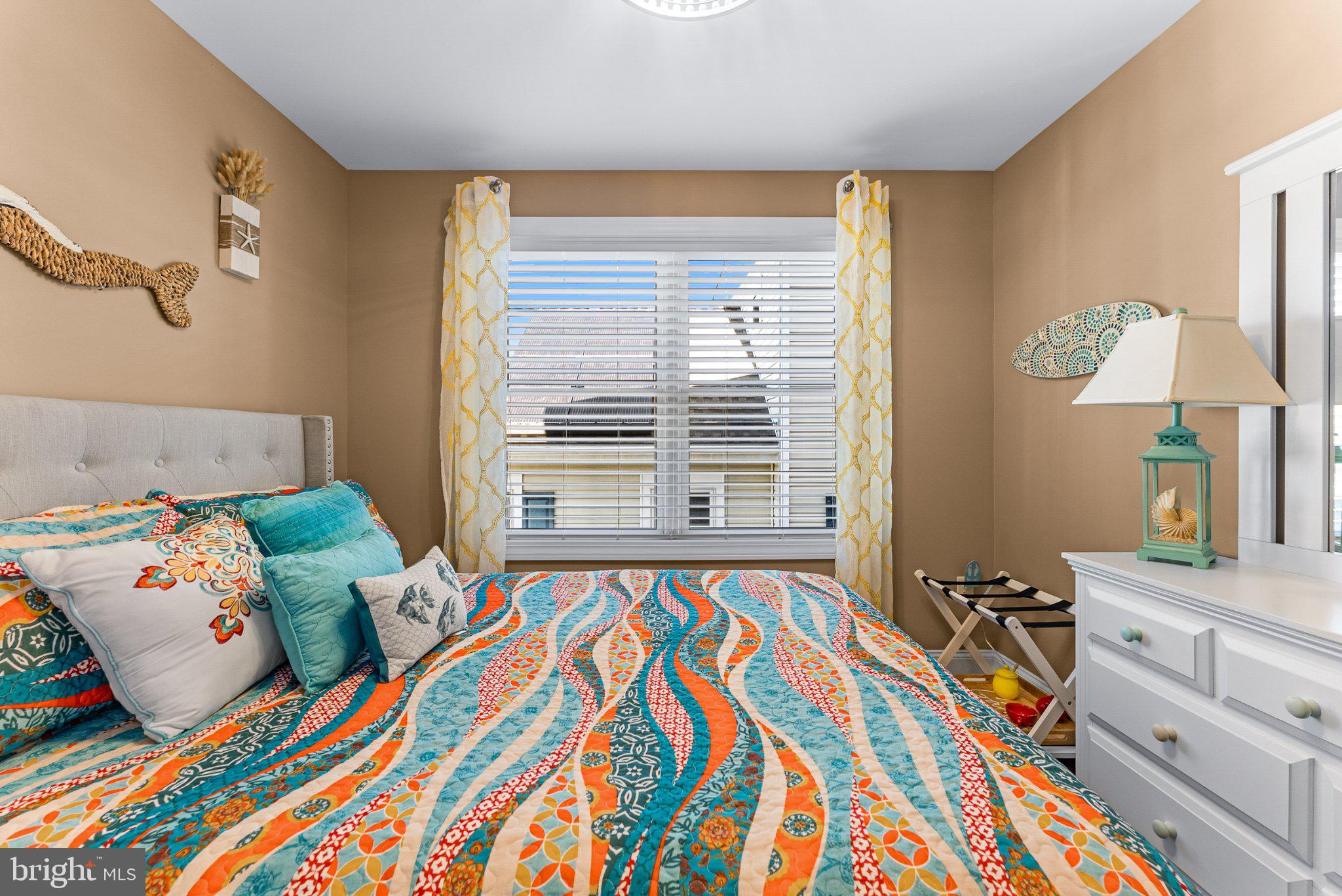 112 West Wisteria Road Wildwood, NJ 08260 - Photo 30 of 48 Vibrant coastal retreat in soft hues.