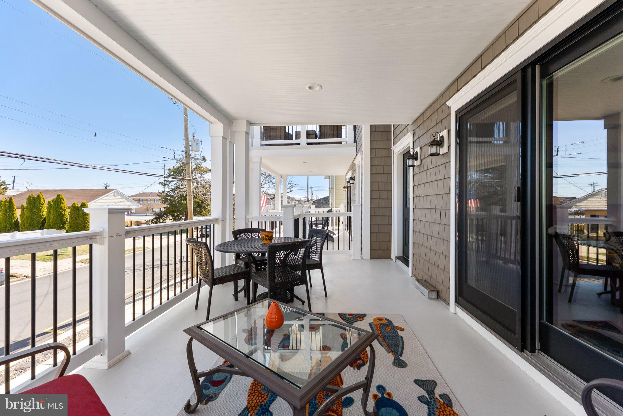 112 West Wisteria Road Wildwood, NJ 08260 - Photo 34 of 48 Sunny porch with inviting views.