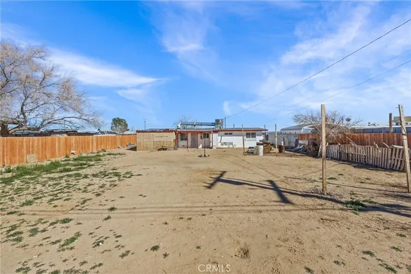 a view of a road with a building in the background