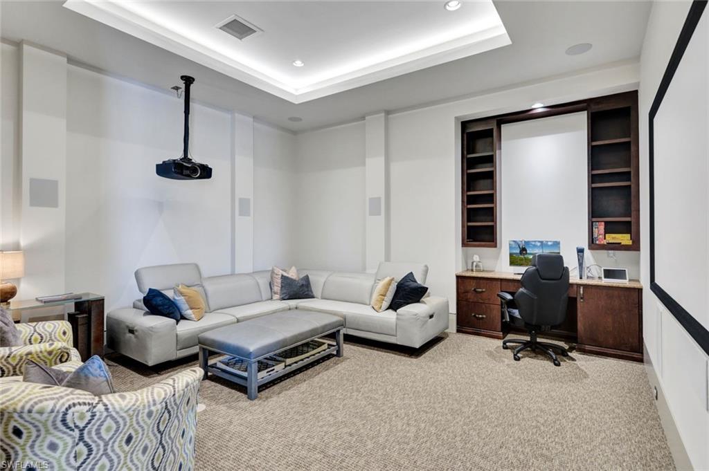 4431 Wayside Drive Naples, FL 34119 - Photo 16 of 49 a living room with furniture and a window