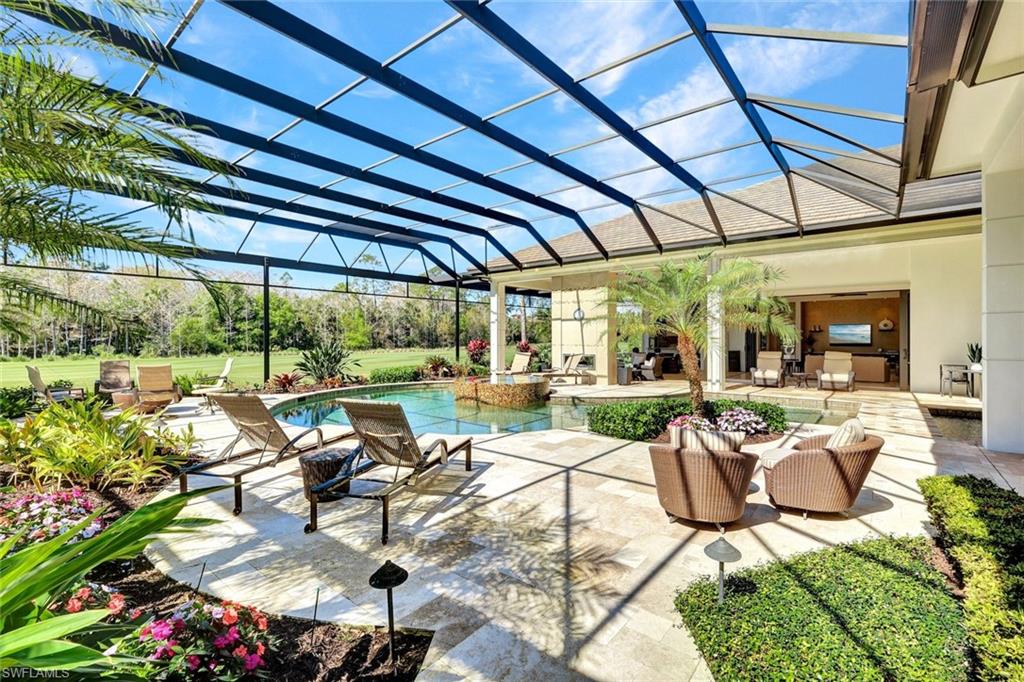 4431 Wayside Drive Naples, FL 34119 - Photo 29 of 49 a view of a patio with chairs and tables in patio