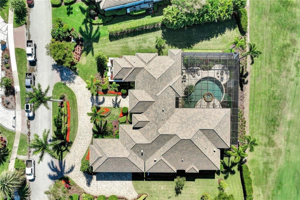 4431 Wayside Drive Naples, FL 34119 - Photo 46 of 49 an aerial view of a house with a yard