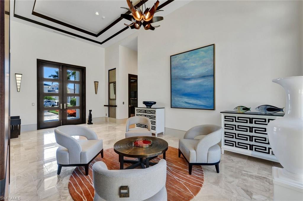 4431 Wayside Drive Naples, FL 34119 - Photo 6 of 49 a living room with furniture