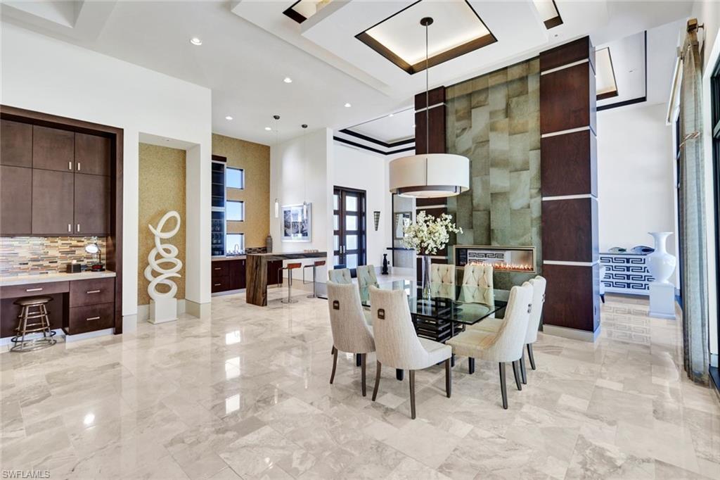 4431 Wayside Drive Naples, FL 34119 - Photo 9 of 49 a view of a dining room with furniture