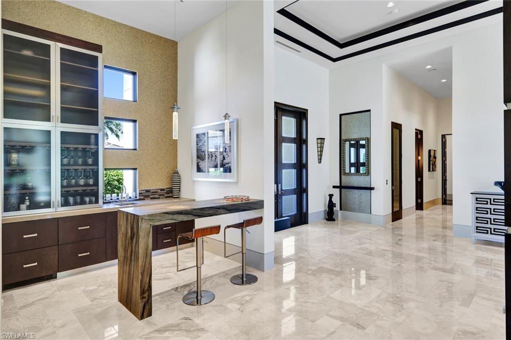 4431 Wayside Drive Naples, FL 34119 - Photo 10 of 49 a view of a workspace with furniture and window