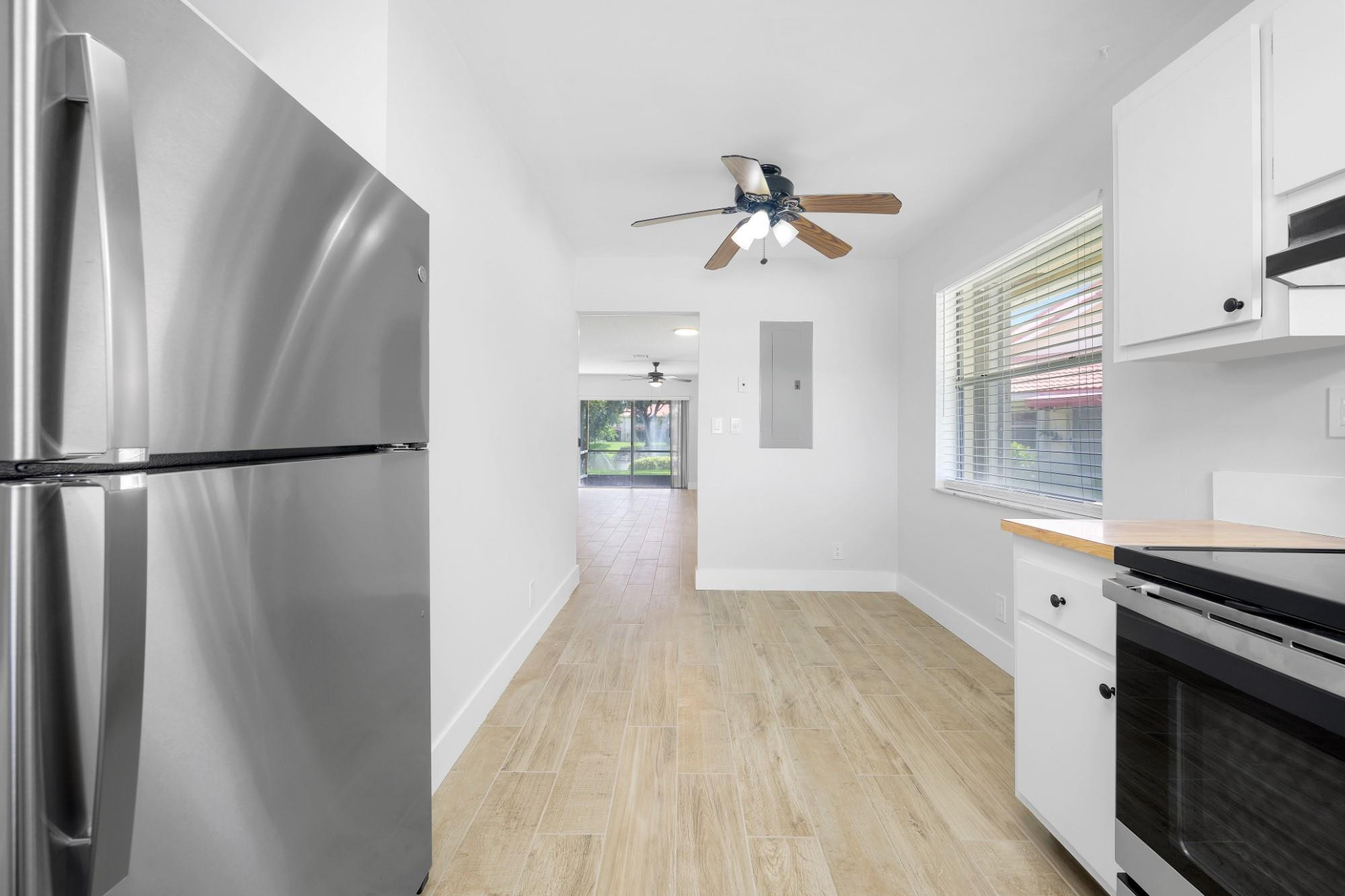6371 Boca Circle Boca Raton, FL 33433 - Photo 14 of 24 a view of a kitchen with electric appliances