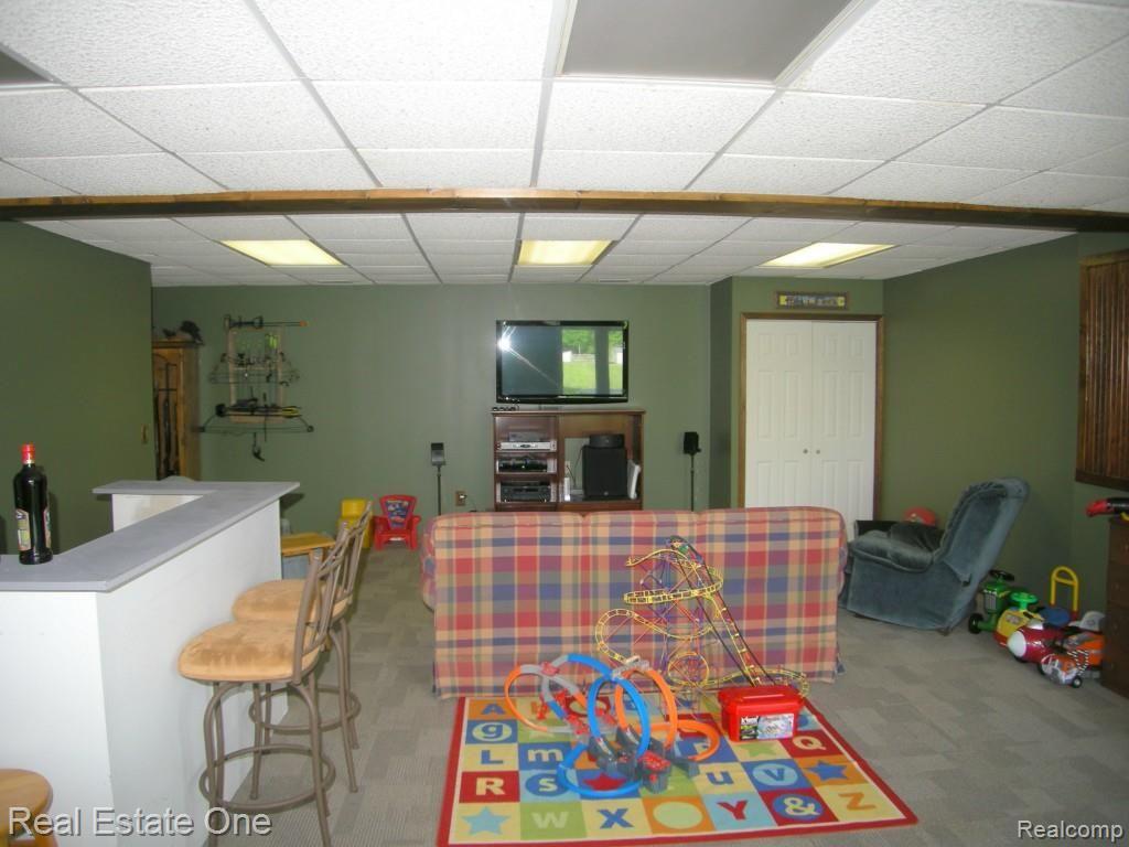 6974 Fish Lake Road Holly, MI 48442 - Photo 38 of 51 Lower Level Family Room