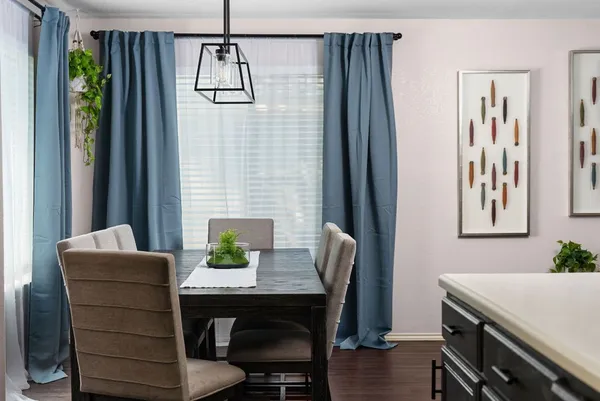 a kitchen with stainless steel appliances a sink a counter space and a window