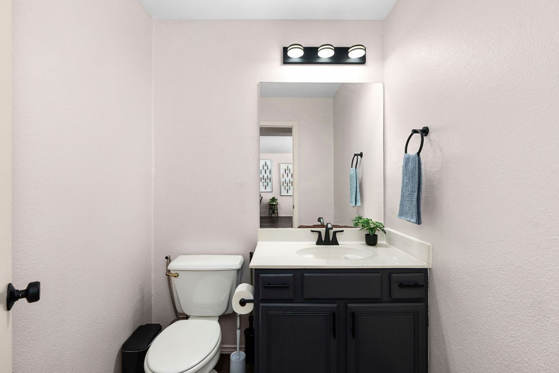 7906 Briarton Drive Austin, TX 78747 - Photo 16 of 38 a bathroom with a sink and a toilet