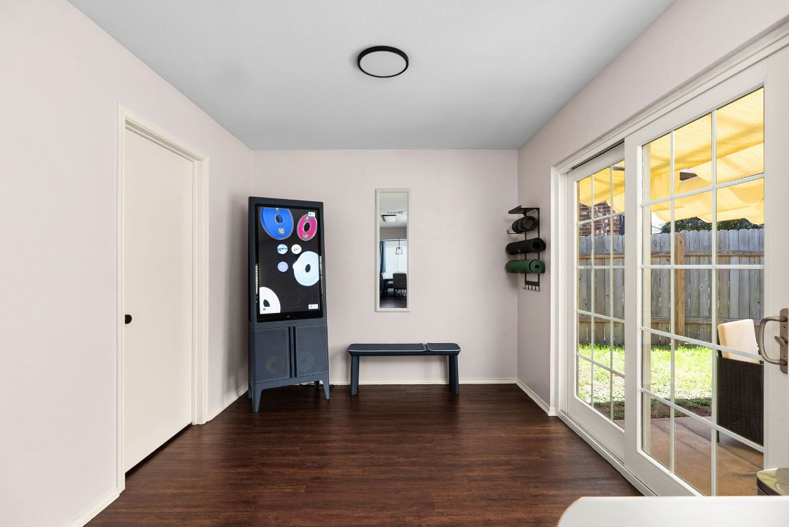 7906 Briarton Drive Austin, TX 78747 - Photo 17 of 38 a view of an entryway with wooden floor