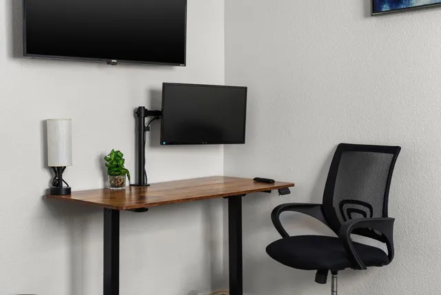 a view of a patio with table and chairs