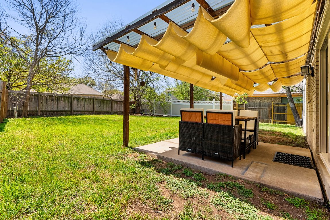 7906 Briarton Drive Austin, TX 78747 - Photo 36 of 38 a view of a yard with a house
