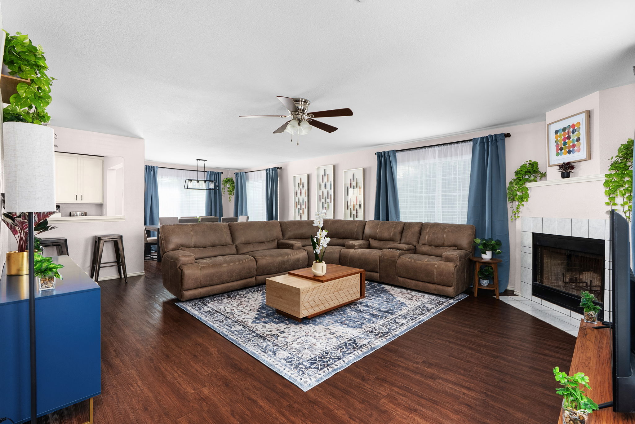 7906 Briarton Drive Austin, TX 78747 - Photo 5 of 38 a living room with furniture and a fireplace