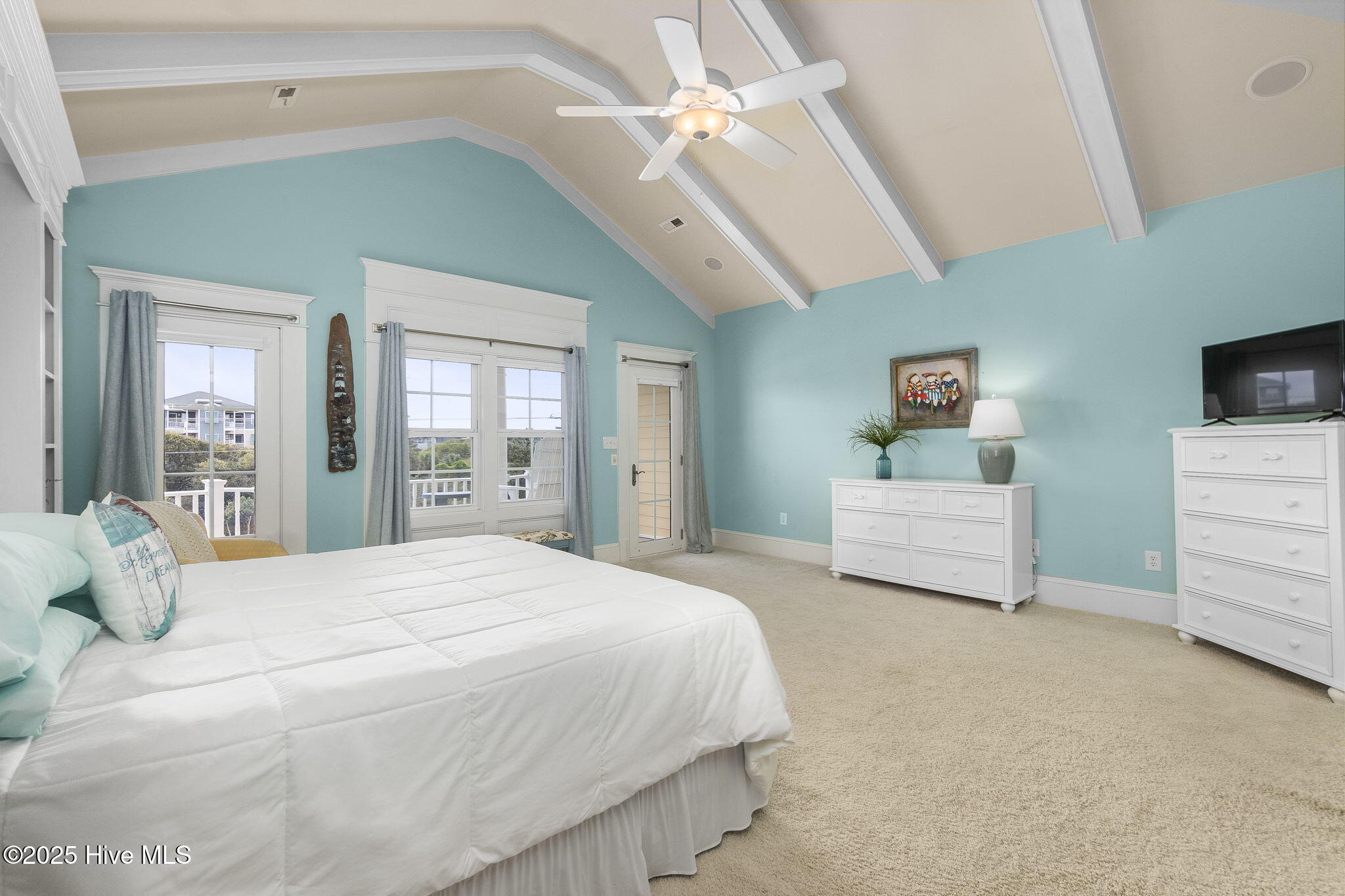 116 Salter Path Road, Unit 102 SEABROOK Pine Knoll Shores, NC 28512 - Photo 23 of 58 Primary bedroom suite w/ private porch