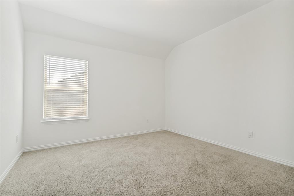 1448 Sun Gdn Way Justin, TX 76247 - Photo 11 of 15 Carpeted room featuring a single window with blinds, white walls, and a white baseboard trim