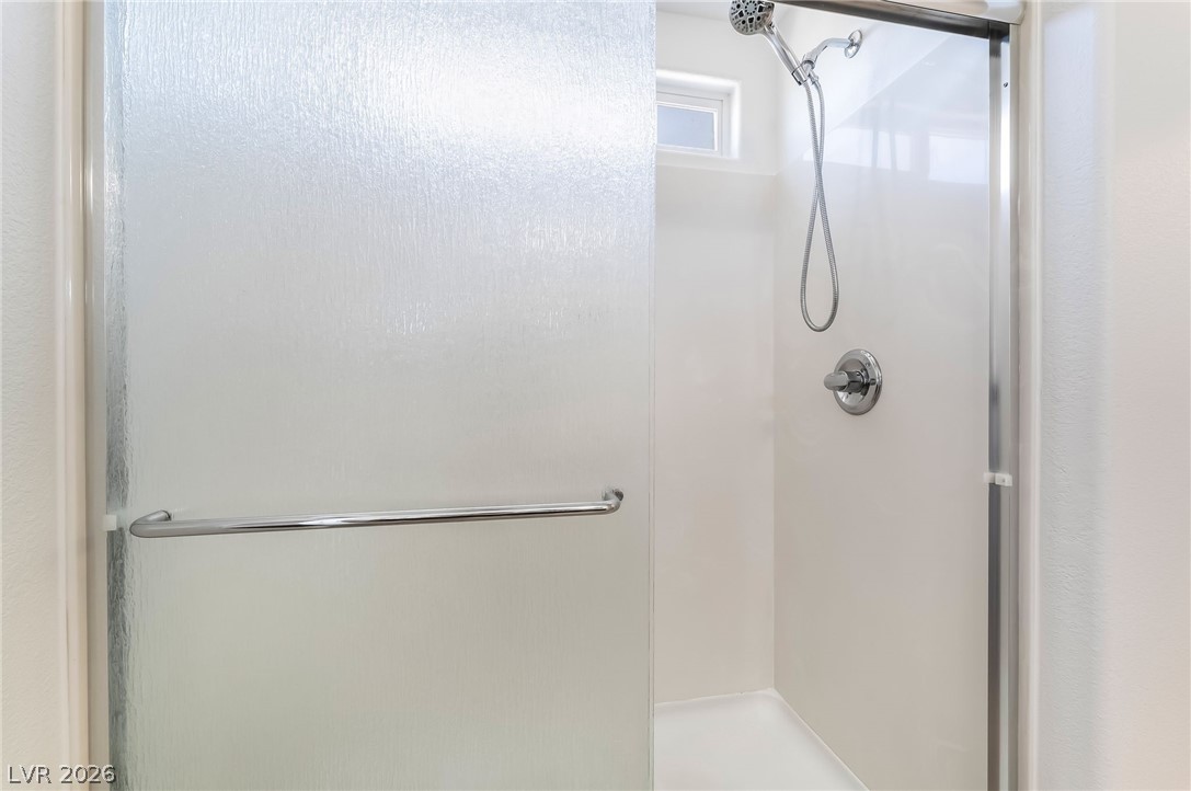 3175 Via Seranova Henderson, NV 89044 - Photo 25 of 45 Step into a refreshing shower experience with this sleek and modern design.