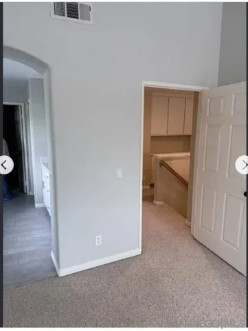 a view of bathroom with tub and shower