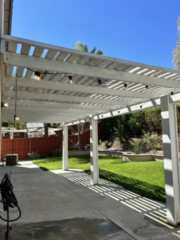 a view of a yard with an outdoor space