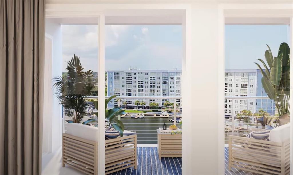5015 Highway 19, Unit 501 New Port Richey, FL 34652 - Photo 4 of 24 a balcony with a table and chairs