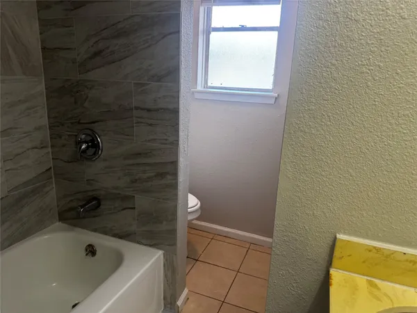 a bathroom with a bathtub