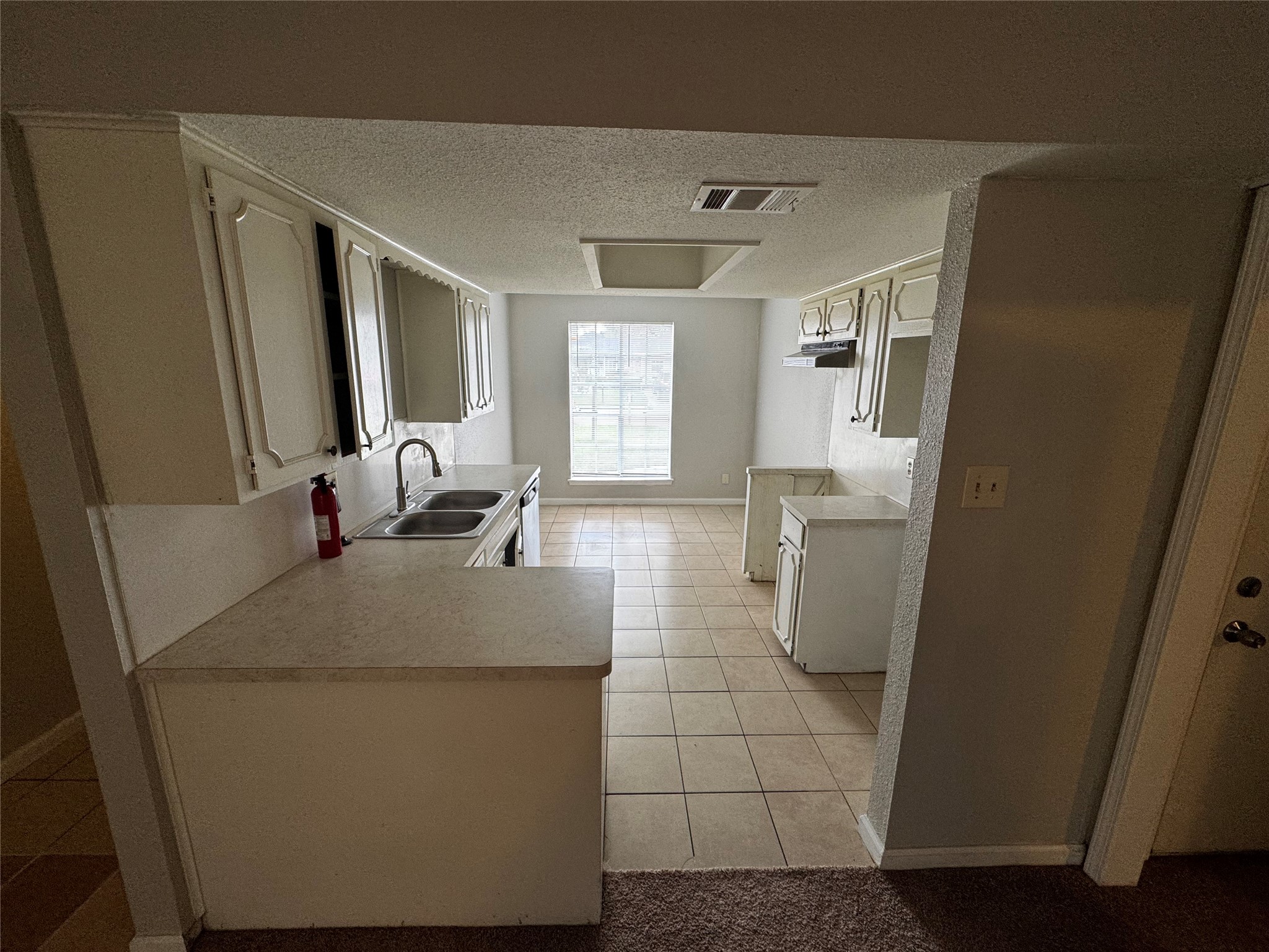 1922 Bunzel Street Houston, TX 77088 - Photo 4 of 16 a living room with a couch