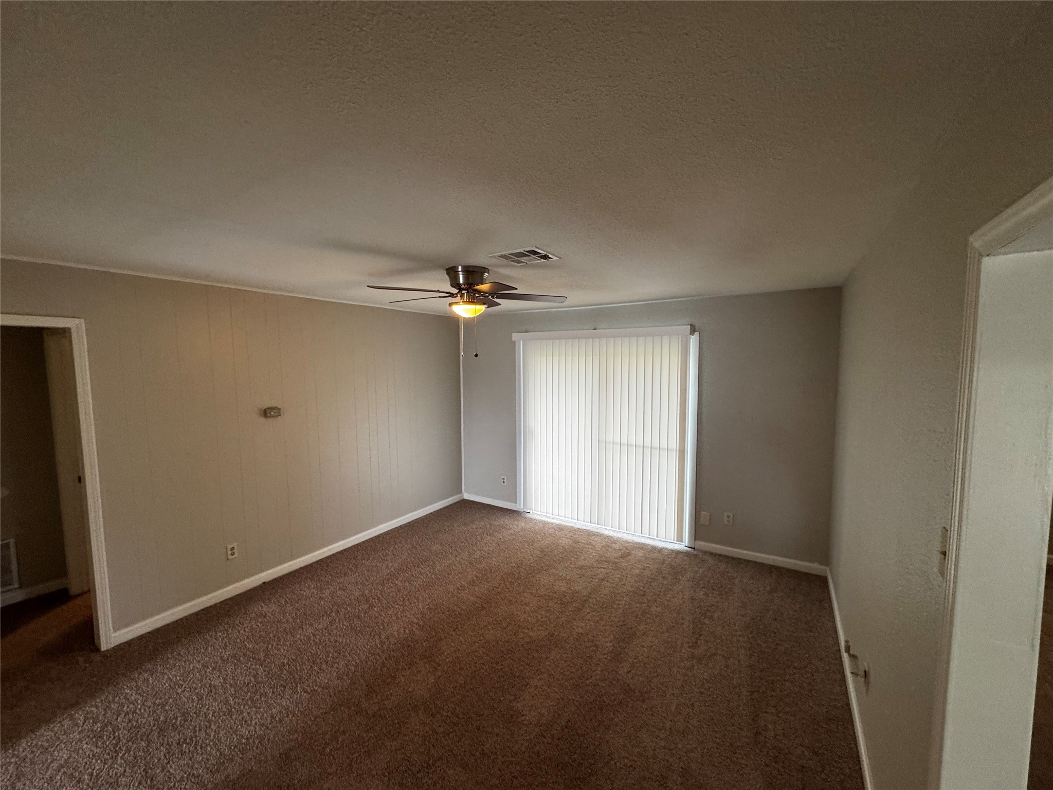 1922 Bunzel Street Houston, TX 77088 - Photo 6 of 16 a view of empty room with window