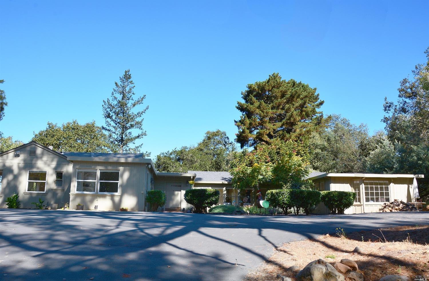 3701 Montecito Avenue Santa Rosa, CA 95404 - Photo 1 of 1 a front view of a house with a yard