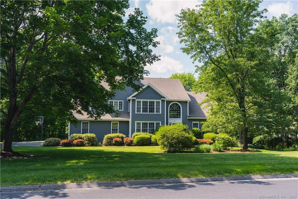 29 Cobblers Mill Road Newtown, CT 06482 - Photo 1 of 1 a front view of a house with a garden