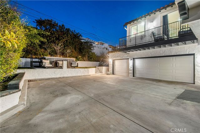 a view of a building with a road