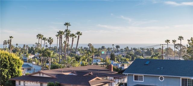 a view of a city with tall buildings