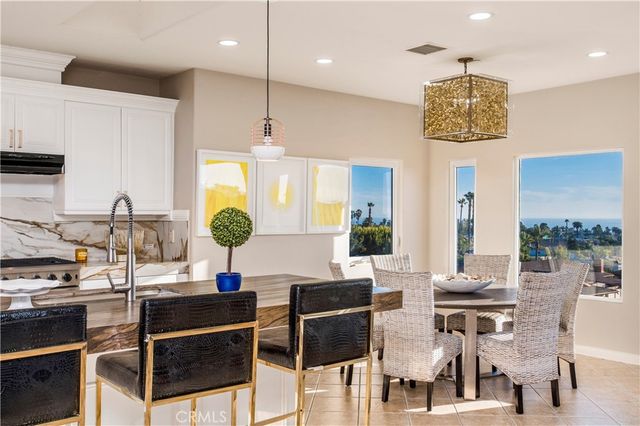 a view of kitchen with breakfast area