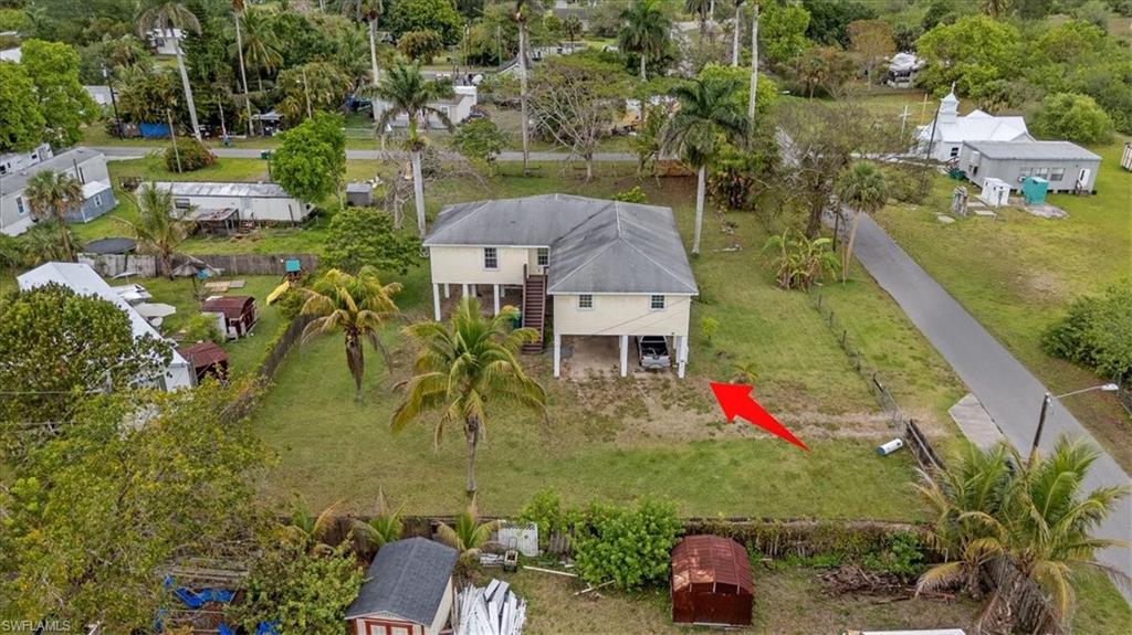 939 Church Avenue Naples, FL 34114 - Photo 29 of 31 an aerial view of a house with a yard