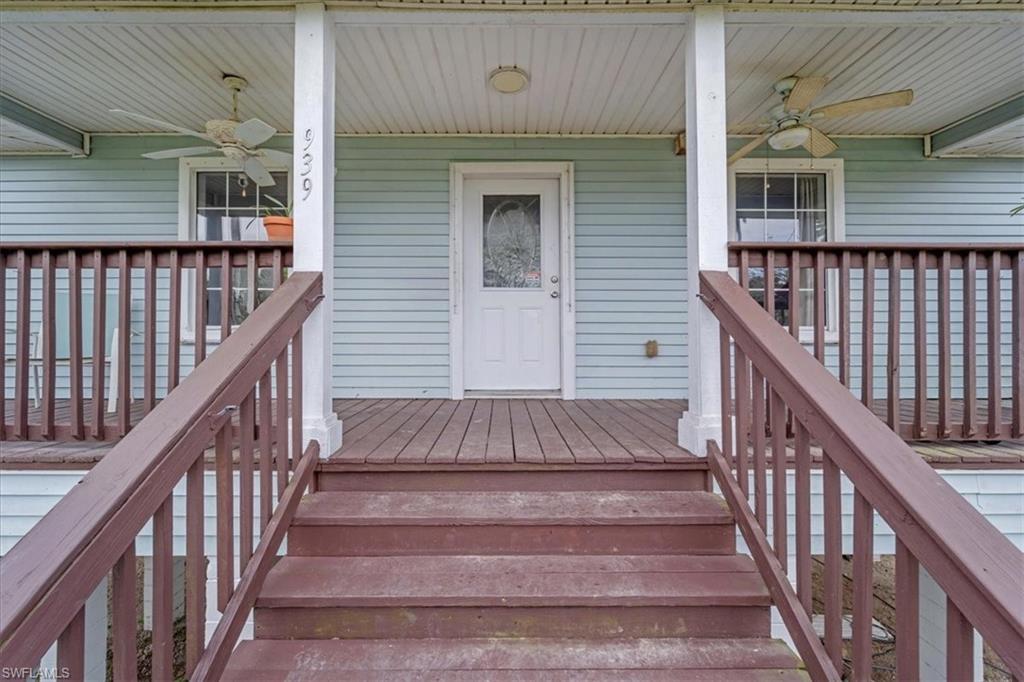 939 Church Avenue Naples, FL 34114 - Photo 4 of 31 a view of entryway with wooden floor