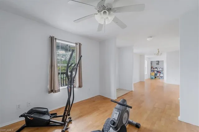 a bedroom with a workspace