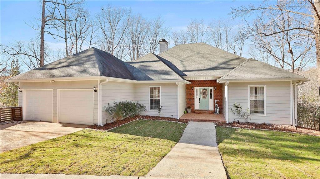 4857 Yeager Road Douglasville, GA 30135 - Photo 1 of 1 a view of a house with a patio
