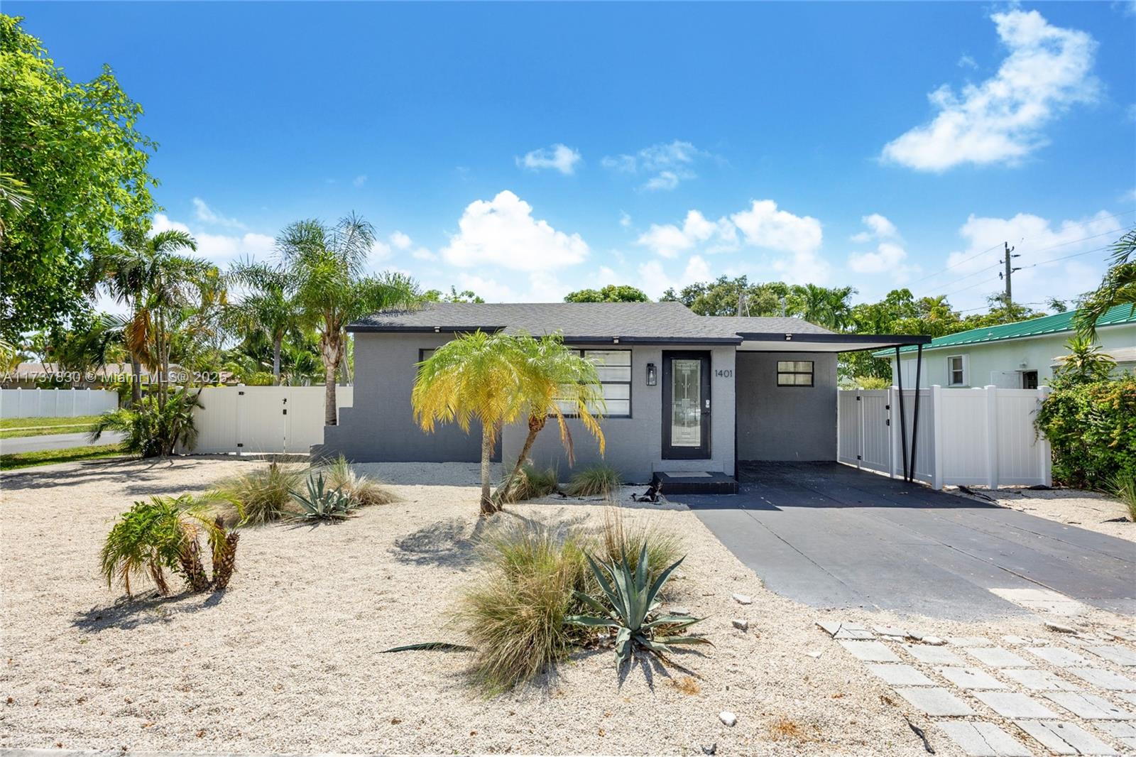 1401 Southwest 3rd Avenue Dania Beach, FL 33004 - Photo 2 of 15 a view of a house with a patio