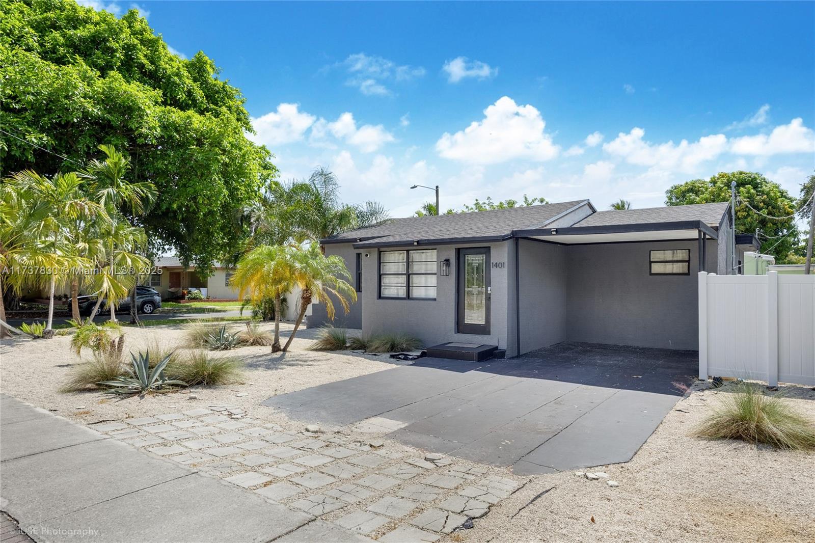 1401 Southwest 3rd Avenue Dania Beach, FL 33004 - Photo 3 of 15 a view of a house with a patio