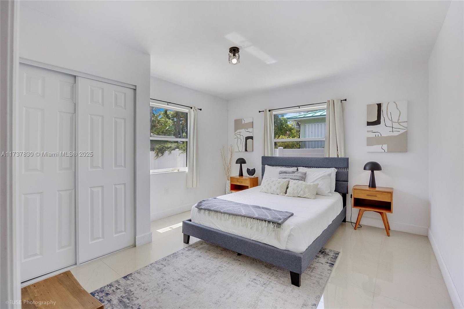 1401 Southwest 3rd Avenue Dania Beach, FL 33004 - Photo 9 of 15 a bedroom with a bed and a window