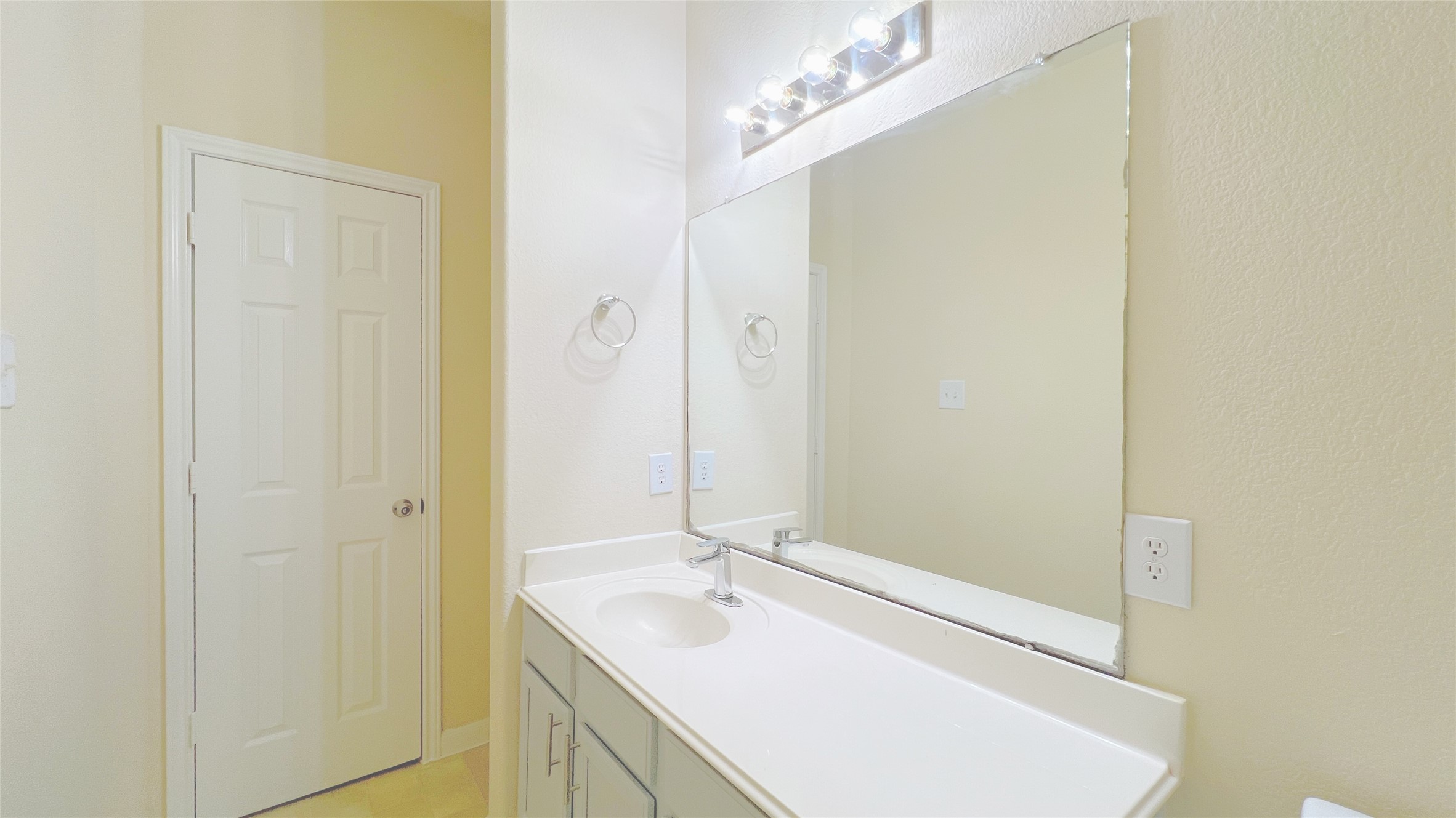 21338 Bella Mountain Drive Spring, TX 77379 - Photo 31 of 33 a bathroom with a sink and a mirror