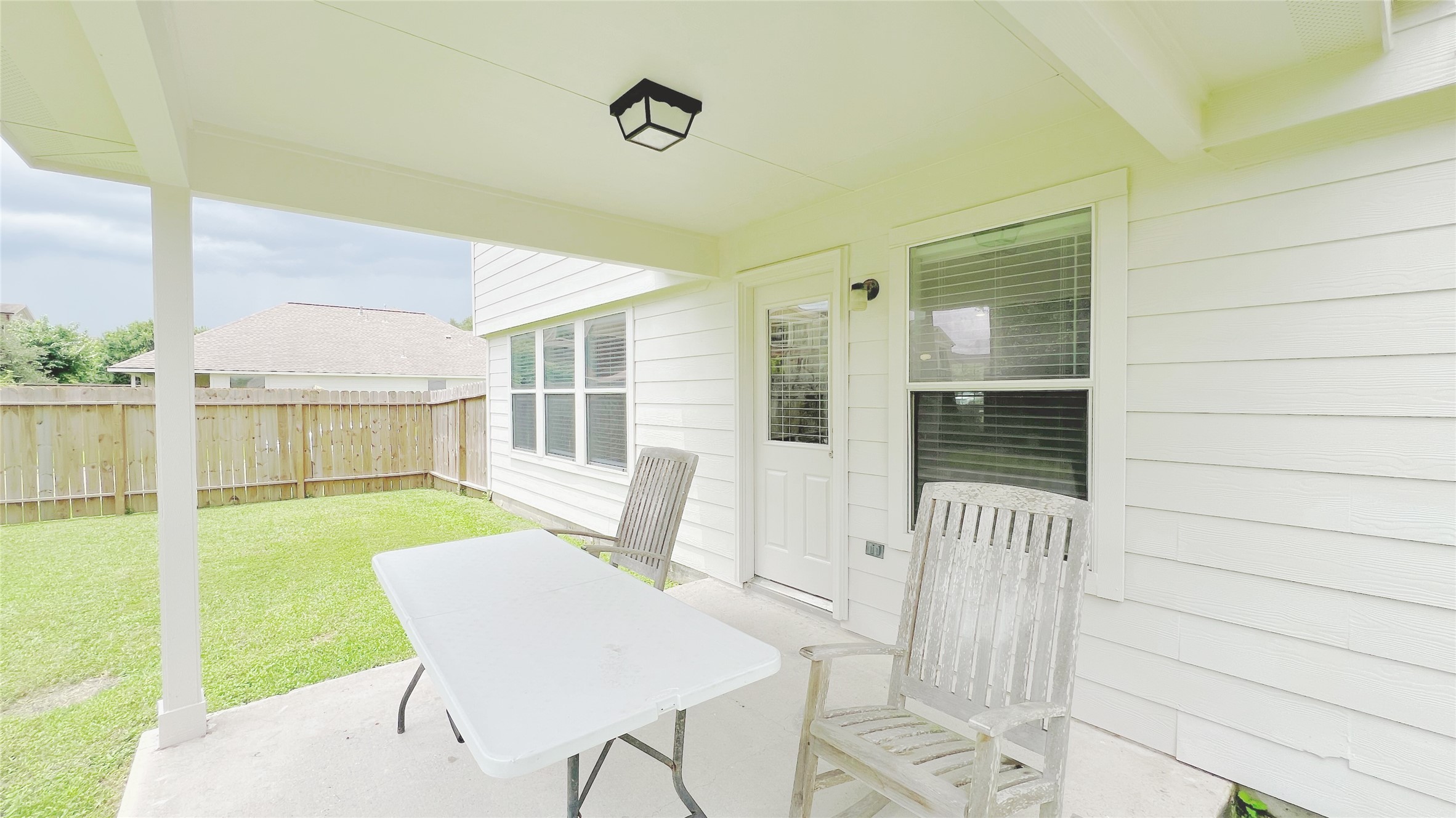 21338 Bella Mountain Drive Spring, TX 77379 - Photo 32 of 33 a view of a porch with furniture