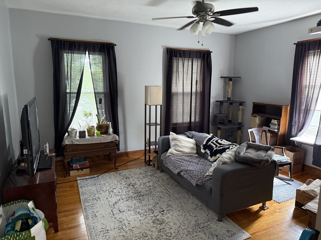 32 Clifton Street, Unit 2 Worcester, MA 01610 - Photo 3 of 12 a living room with furniture and a window