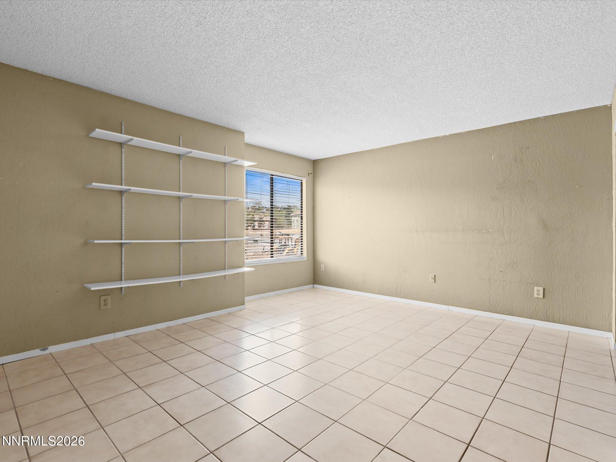 2845 Idlewild Drive, Unit 102 Reno, NV 89509 - Photo 16 of 44 a view of an empty room