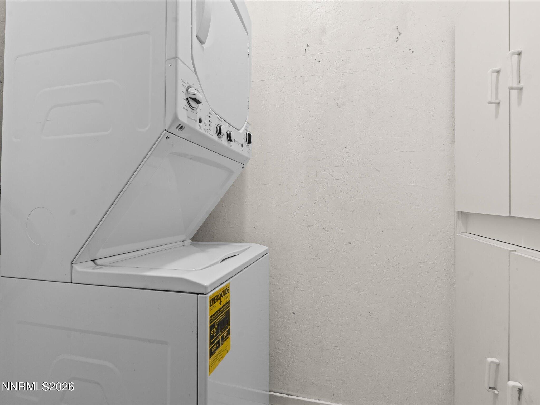 2845 Idlewild Drive, Unit 102 Reno, NV 89509 - Photo 27 of 44 a utility room with dryer and washer