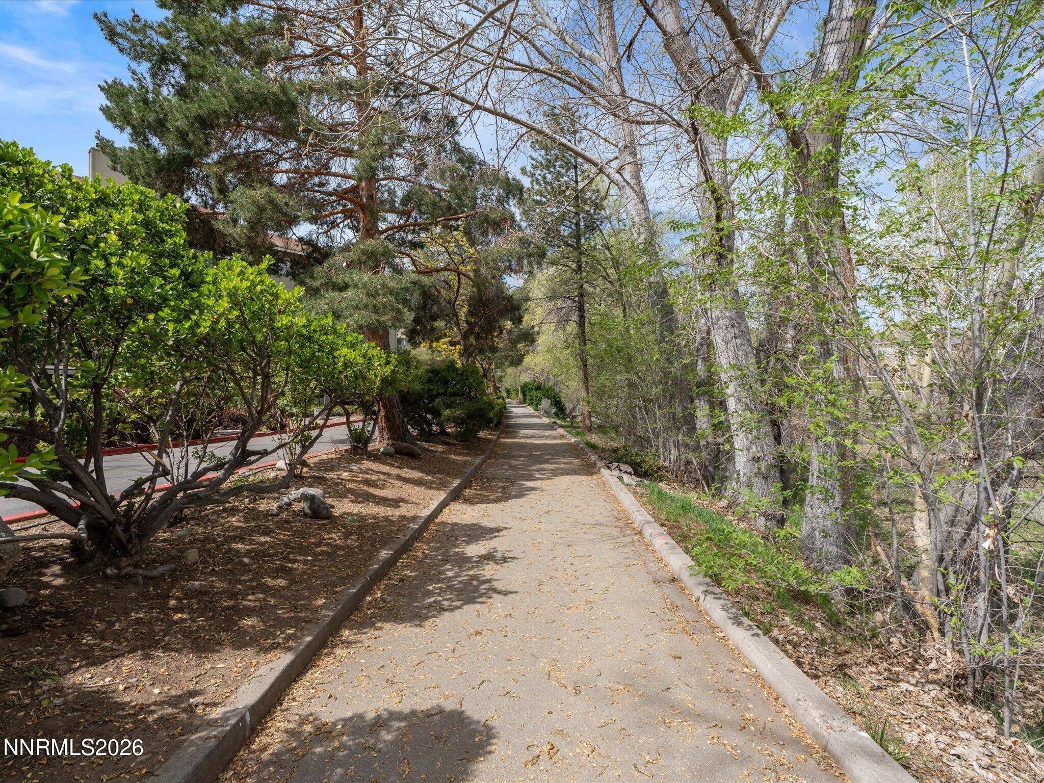 2845 Idlewild Drive, Unit 102 Reno, NV 89509 - Photo 36 of 44 a view of a pathway with a yard