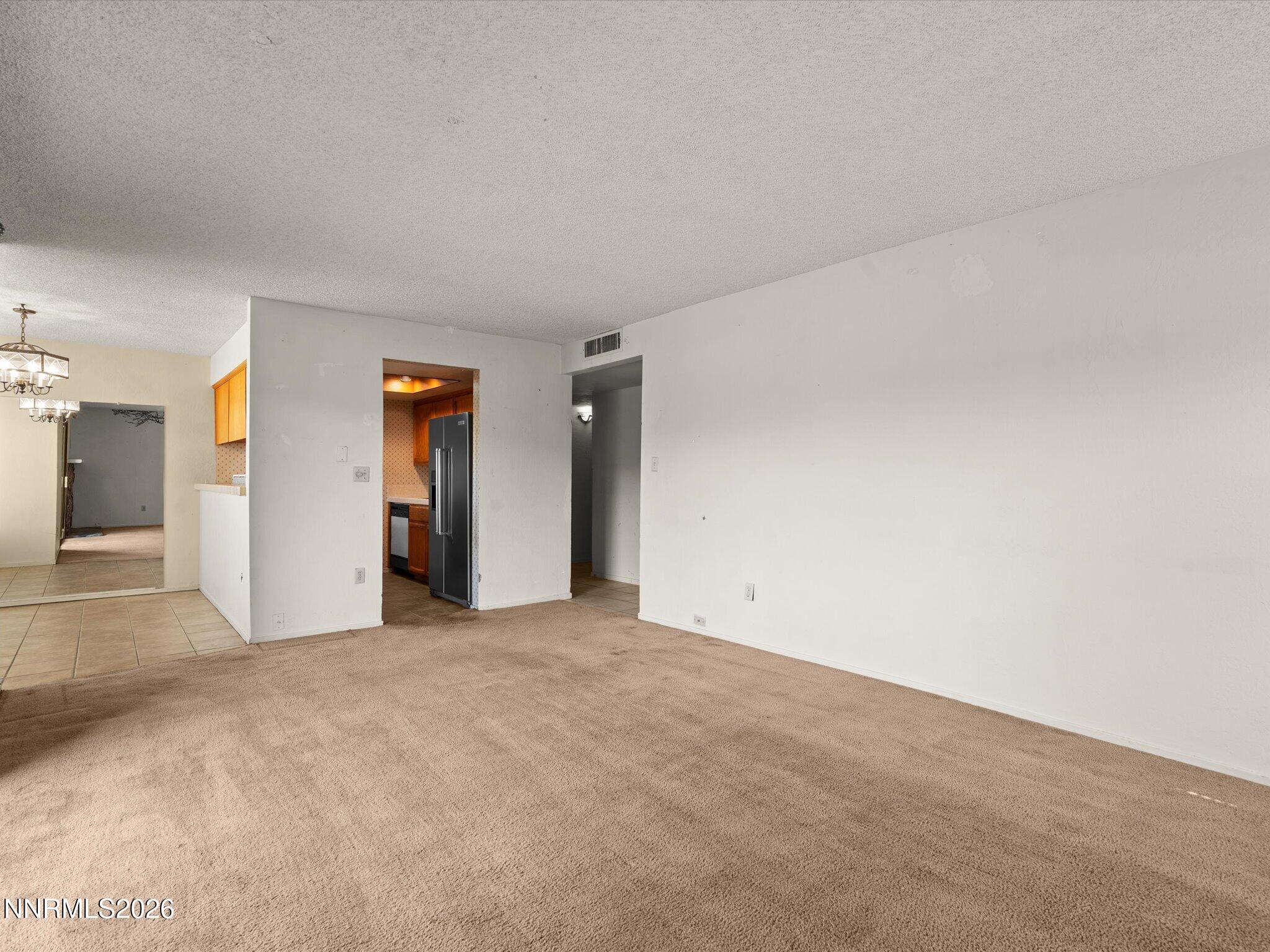 2845 Idlewild Drive, Unit 102 Reno, NV 89509 - Photo 9 of 44 a view of an empty room