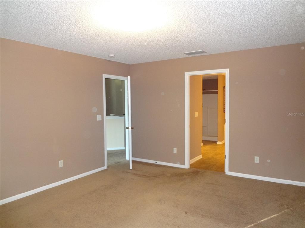 6 Buffalo Grove Drive Palm Coast, FL 32137 - Photo 23 of 24 an empty room with closet area