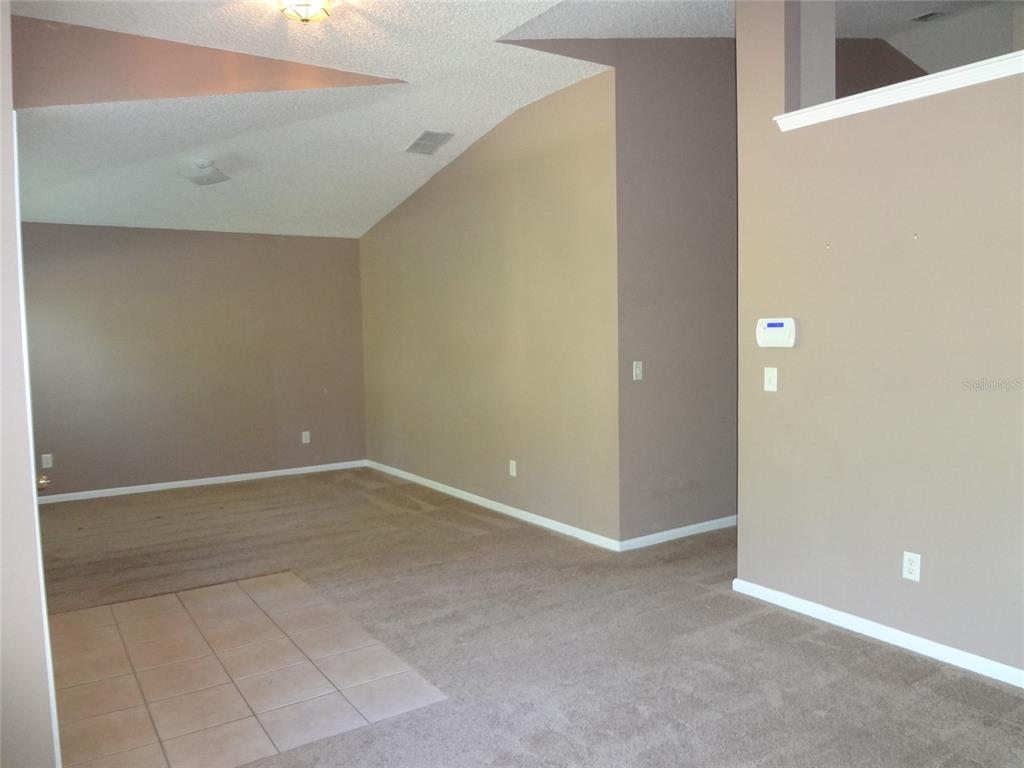 6 Buffalo Grove Drive Palm Coast, FL 32137 - Photo 4 of 24 a view of an empty room