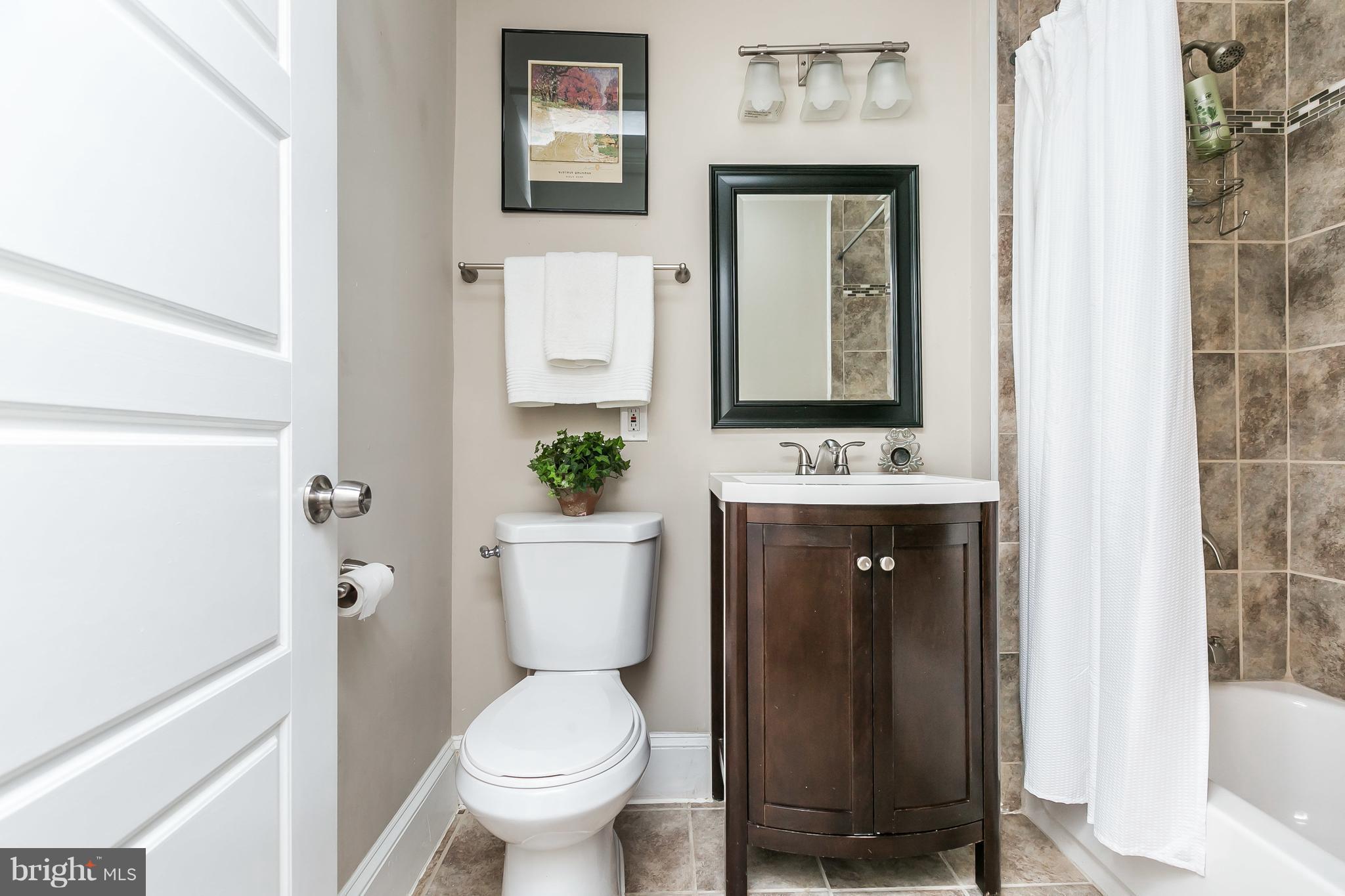 11 Ridge Road Baltimore, MD 21228 - Photo 20 of 30 hall bath with ceramic tile